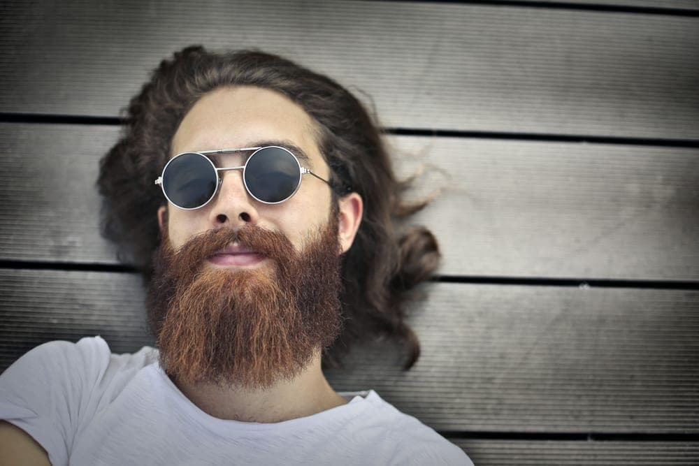 A man with a thick full beard