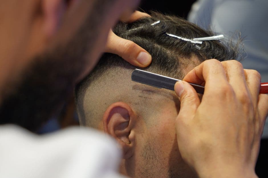 Beard grooming products laid out on a surface