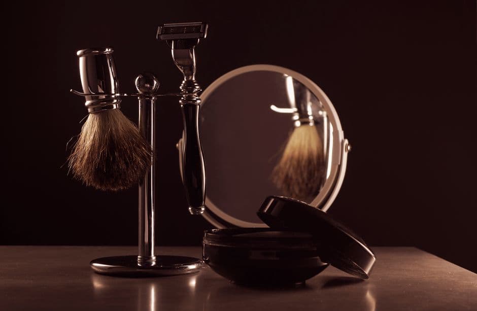 Small grooming tools laid out on a bathroom counter