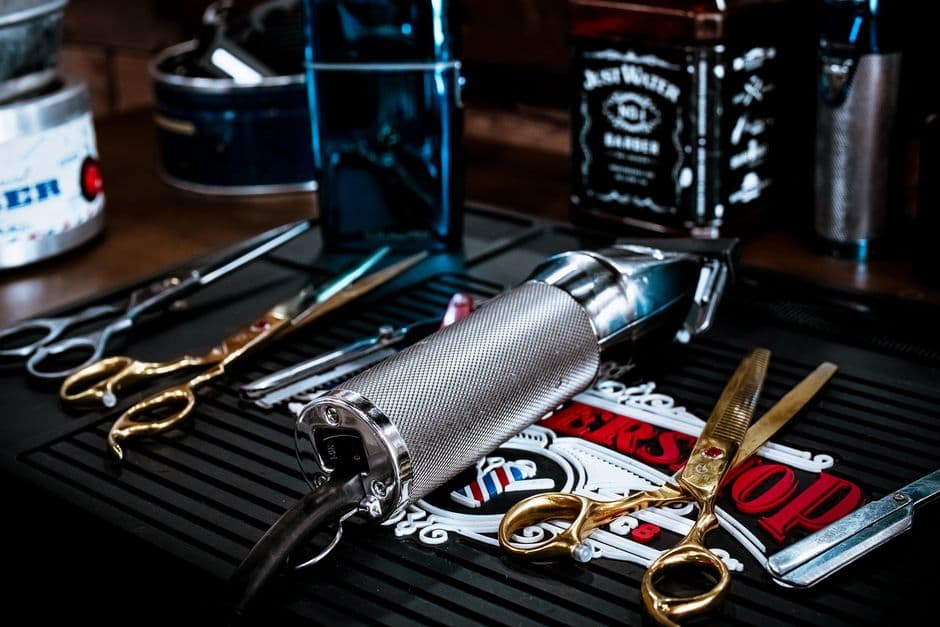 Professional clippers on a barber station