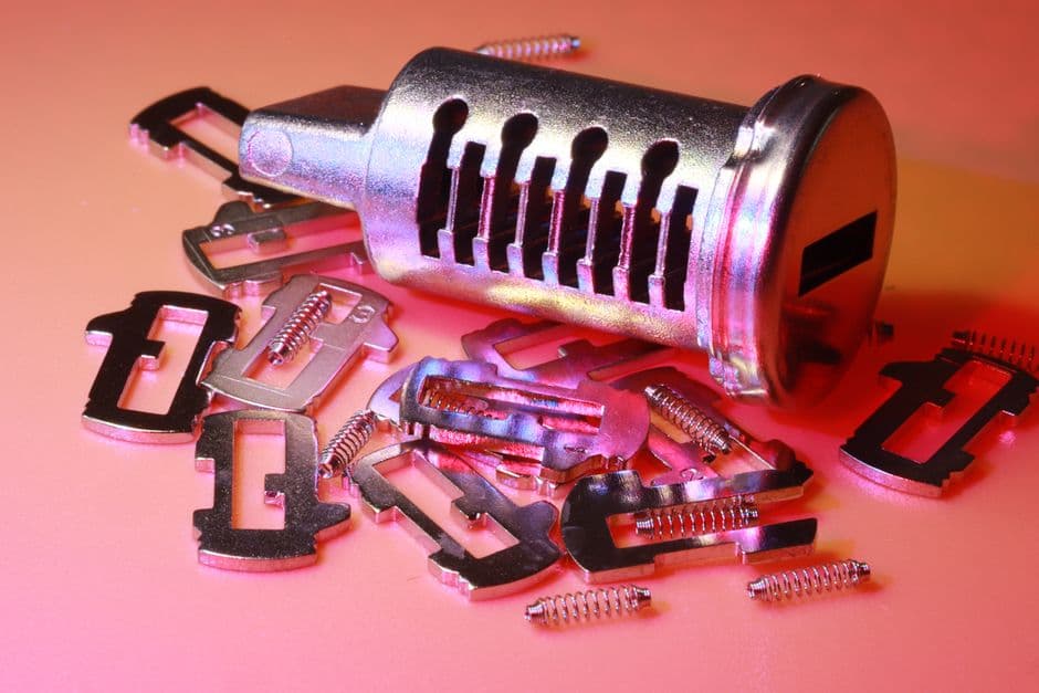 A safety razor head disassembled on a counter