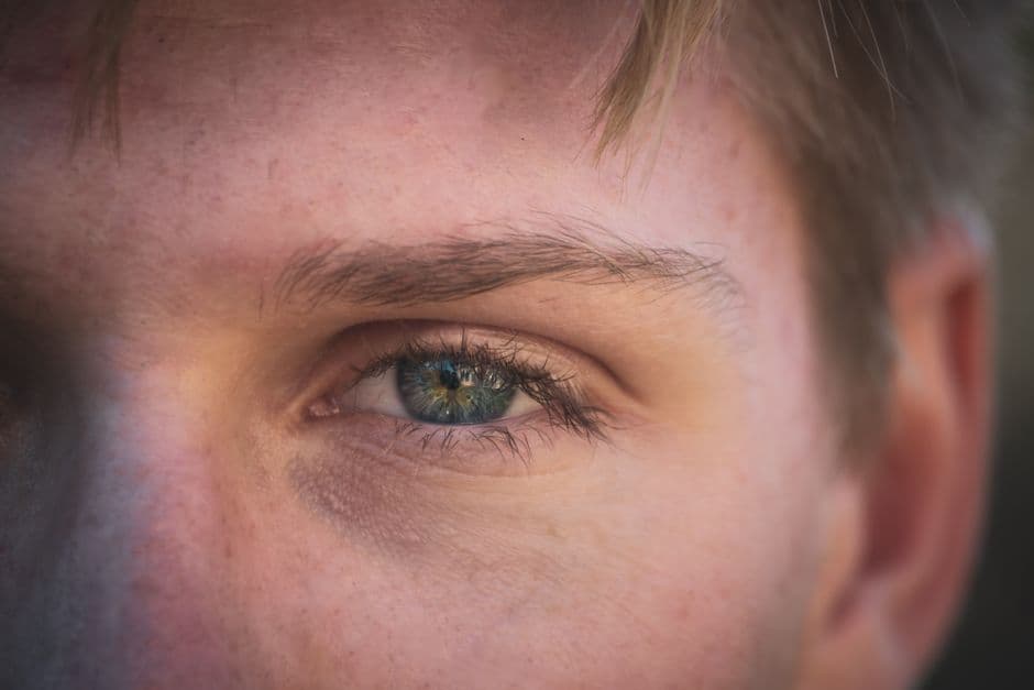A close-up of the skin around a man’s eye