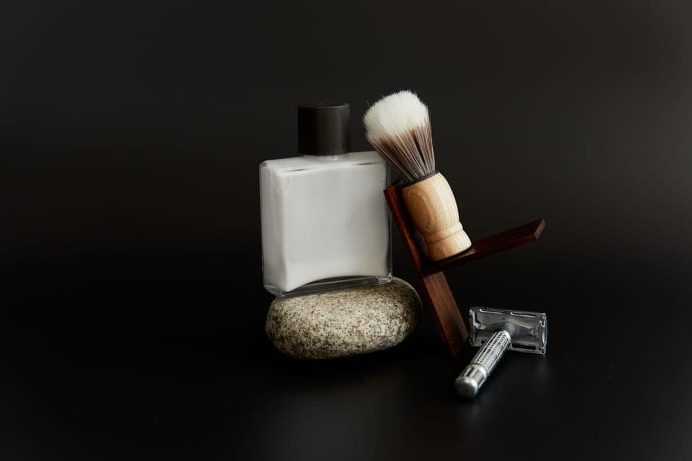 Men's skincare products lined up on a shelf