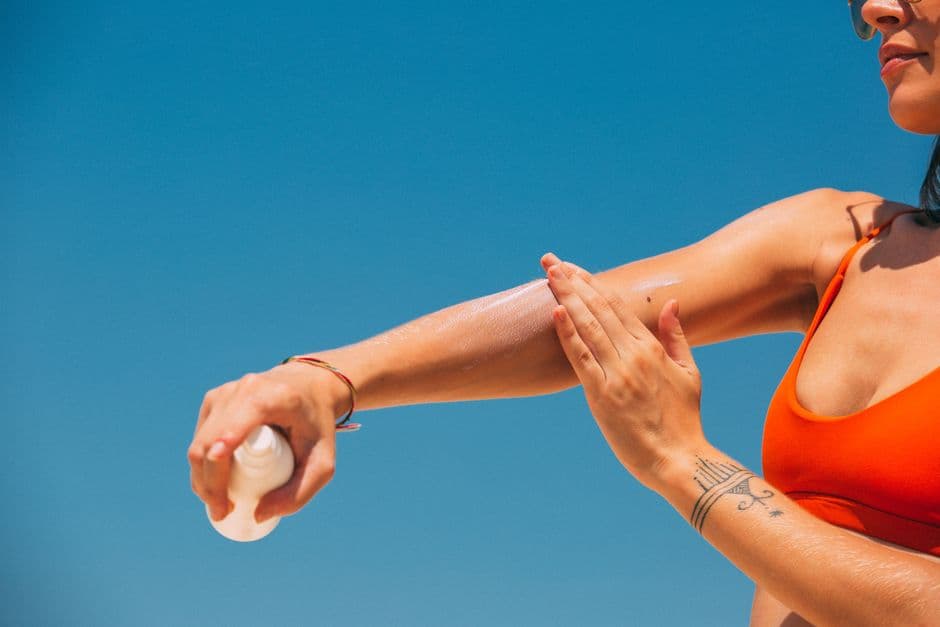 A sunscreen bottle in sunlight