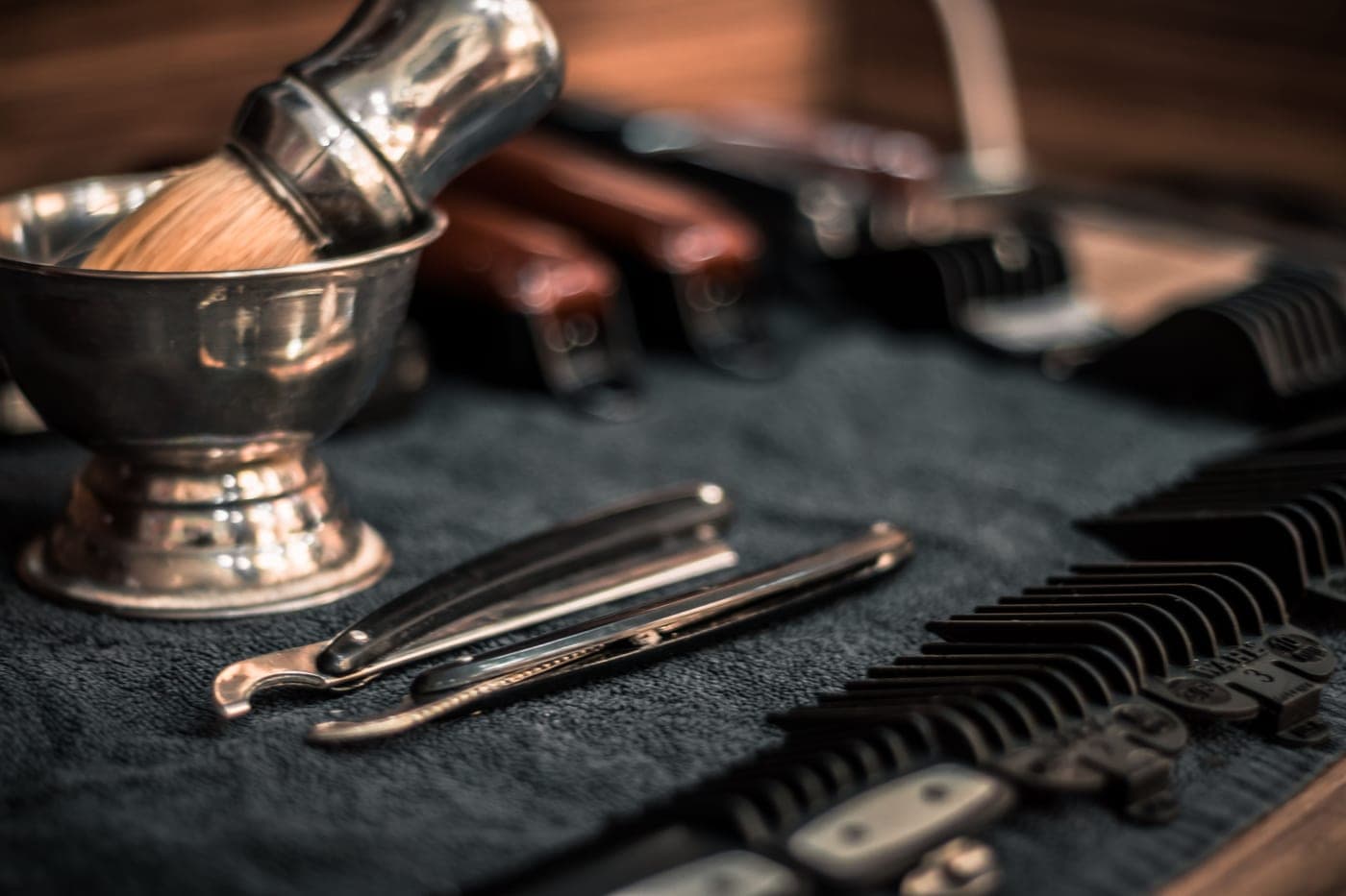 Stacked razor blades on a metal surface